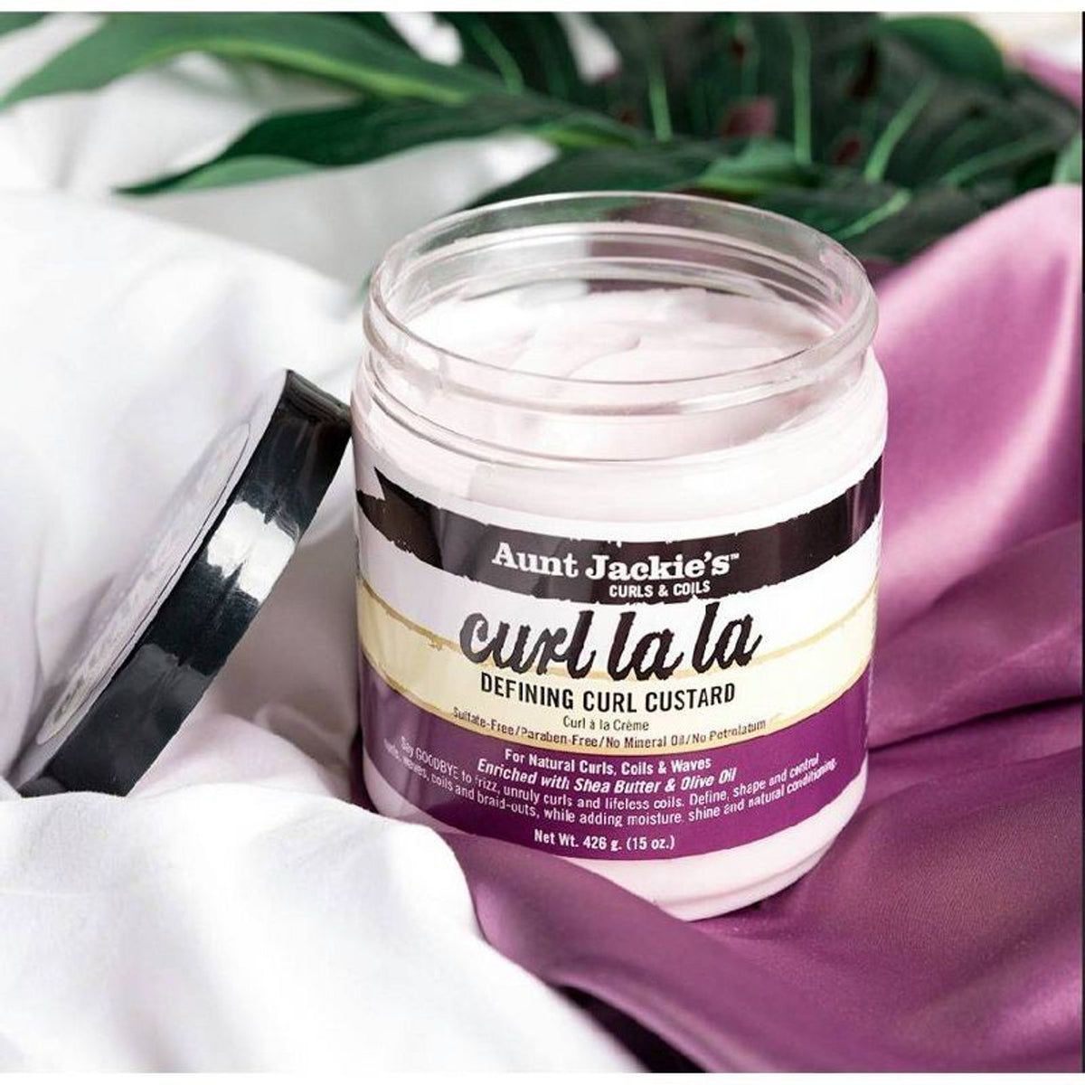 كريم تصفيف الشعر المجعد من Aunt Jackies La La Defining Curl Custard المعزز بزبدة الشيا وزيت الزيتون